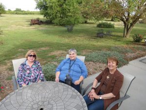 Judy Nelson, Jill Claflin and Glennis Nagel enjoy the view at Burchell's White Hill Farmhouse Inn, site of NPW's fall convention.